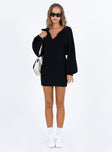 front view of model wearing Princess Polly Quinten Mini Dress Black Lower Impact V-Neck 