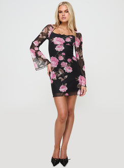 front view of model wearing Princess Polly Bilbao Long Sleeve Mini Dress Black / Floral Square Neck 