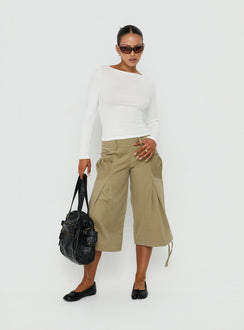 Crafted with the Iria Capri Trouser Khaki womens-regular-pants featuring mid-rise waist side view of model wearing Princess Polly