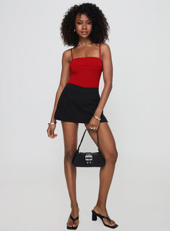 front view of model wearing Princess Polly Lilani Bodysuit Red Sleeveless Square Neck 