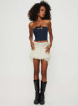   side view of model wearing Princess Polly Ayra Lace Mini Skirt Cream Petite Mini Skirts 