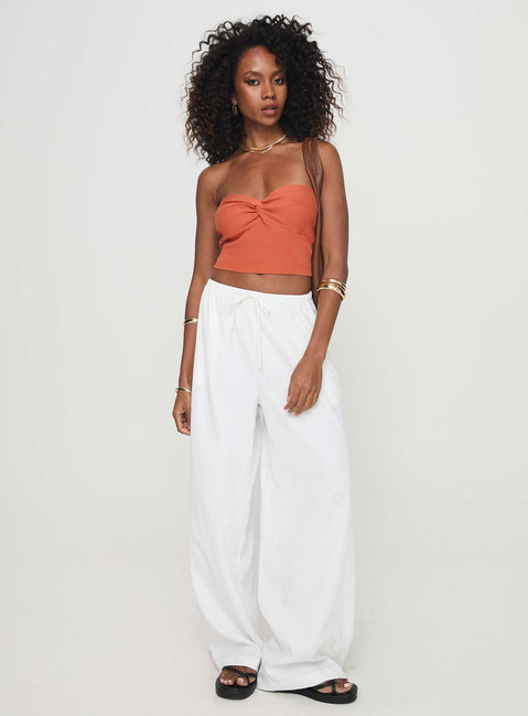 back view of model wearing Princess Polly Kallista Top Orange Sleeveless Sweetheart 