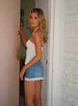   side view of model wearing Princess Polly Miyuki Denim Mini Skirt Mid Wash Mini Skirts 