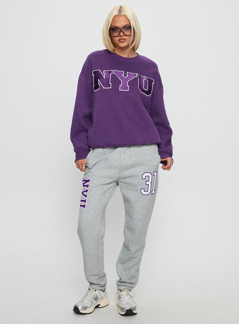 side view of model wearing Princess Polly NYU Offside Crewneck Sweatshirt Purple 