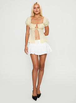 front view of model wearing Princess Polly How To Fly Tie Detail Top Yellow Short Sleeves Square Neck 