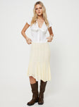Top V-neckline, knit lace trim, tie detail at bust, button fastening at front