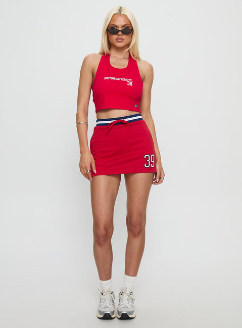   front view of model wearing Princess Polly Boston University Basketball Skirt Red Mini Skirts 