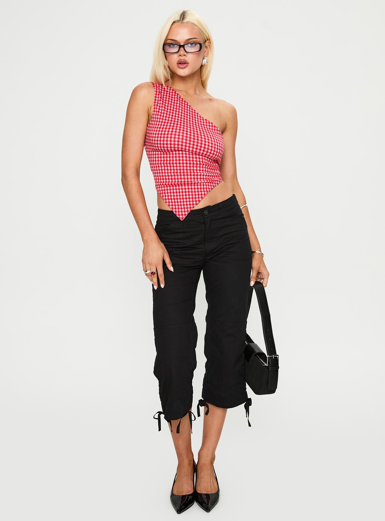 side view of model wearing Princess Polly Sunday Sunrise Tie Back Top Red Check Sleeveless Asymmetric Neckline 