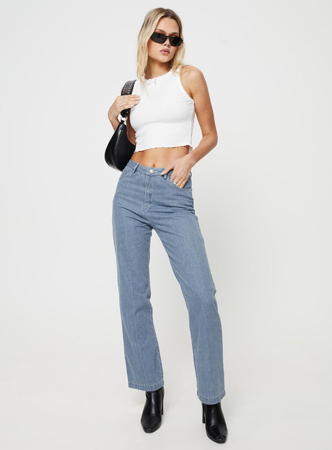 Front view of model wearing  front Princess Polly High Waisted  Langley Jeans Mid Wash Denim