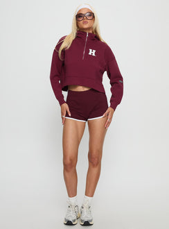 front view of model wearing Princess Polly Harvard Buttersport Half-zip Hoodie Crimson cropped 