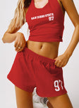 front view of model wearing Princess Polly SDSU Soffee Shorts Red High Waisted Shorts 