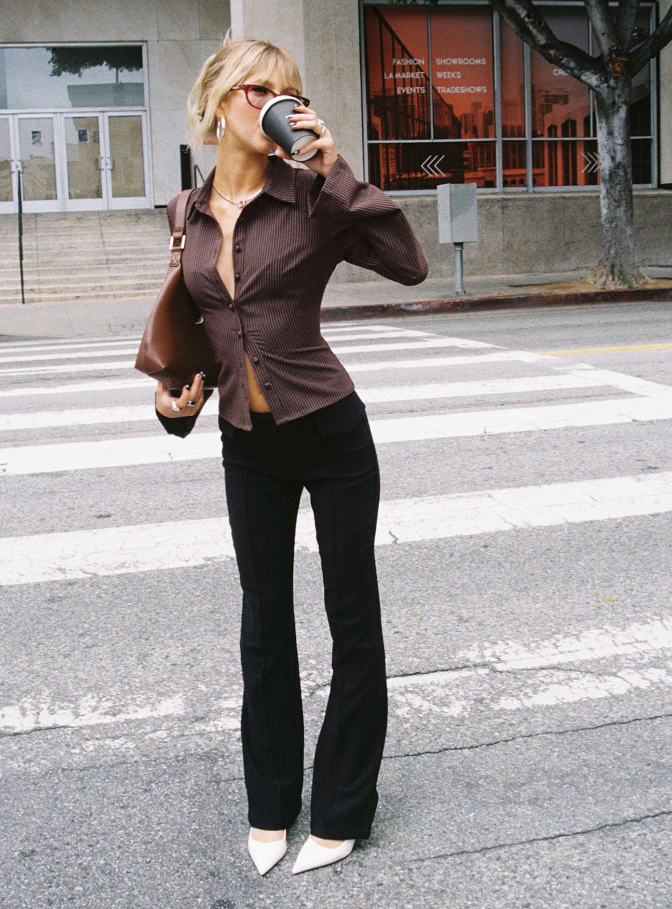 front view of model wearing Princess Polly Caraway Pants Black Low Rise Pants 