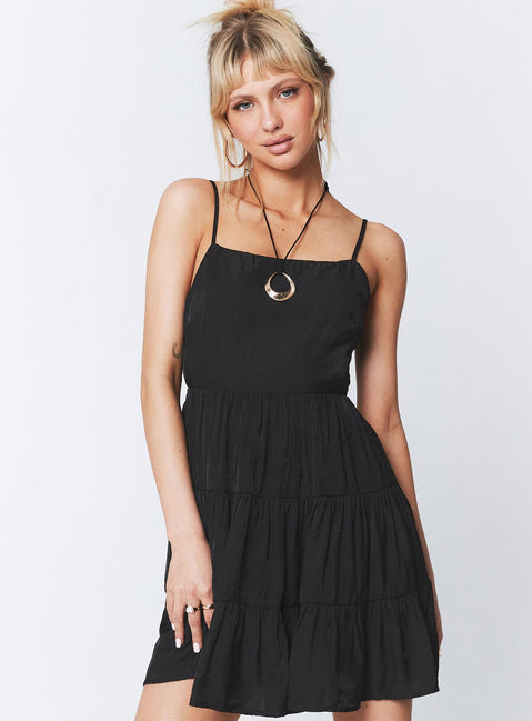 Front view of model wearing  front Princess Polly Asymmetric Neckline  Summer Break Mini Dress Black