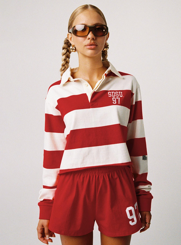 front view of model wearing Princess Polly SDSU Rugby Polo Red / White Full Sleeves High Neck 