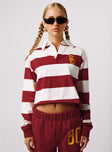 front view of model wearing Princess Polly USC Rugby Polo Cardinal Red Full Sleeves High Neck 