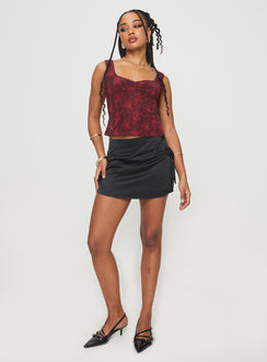 front view of model wearing Princess Polly Rehna Top Red Floral Sleeveless V-Neck 