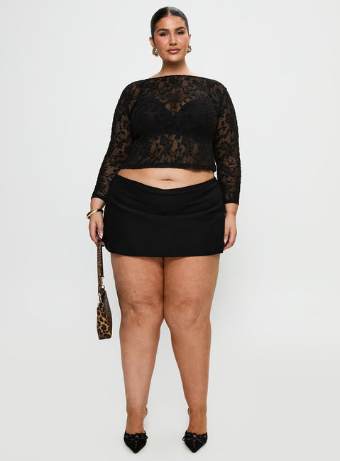 side view of model wearing Princess Polly Martine Sheer Top Black Curve Full Sleeves Boat Neck 