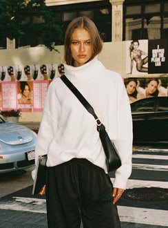back view of model wearing Princess Polly Oswin Turtleneck Sweater White Long 