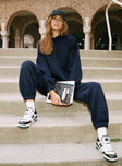 front view of model wearing Princess Polly Dream Fleece Ankle Cuff Sweatpants Navy High Waisted Pants 