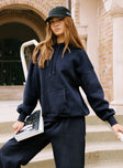 side view of model wearing Princess Polly Dream Fleece Classic Hoodie Navy 