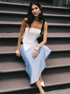   side view of model wearing Princess Polly Resistance Asymmetrical Maxi Skirt Blue Maxi 