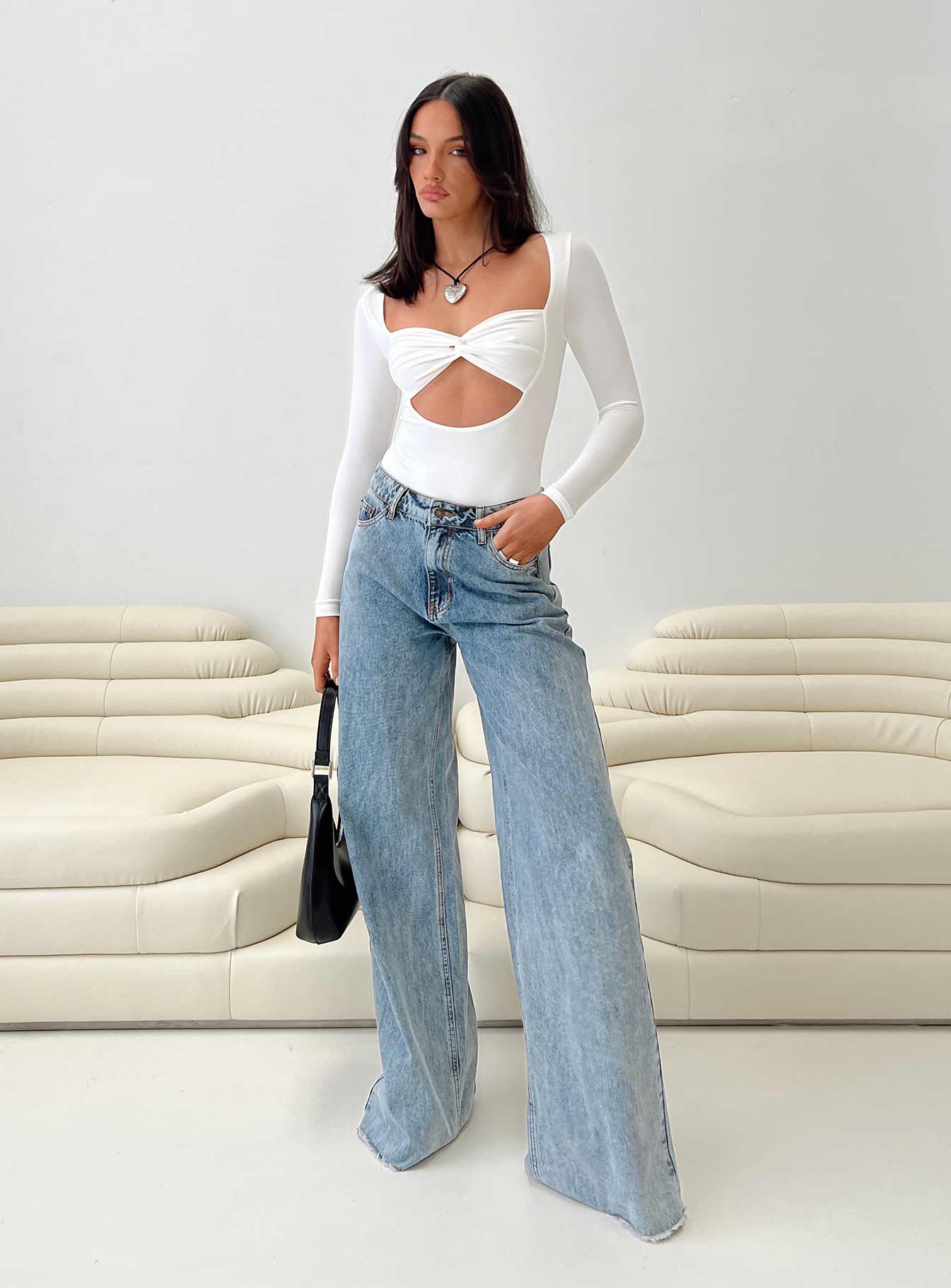 front view of model wearing Princess Polly Zalin Long Sleeve Bodysuit White Full Sleeves 