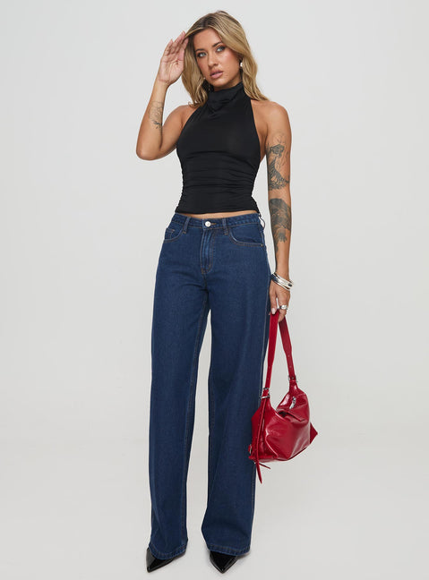 side view of model wearing Princess Polly Giggle Top Black Sleeveless High Neck 