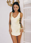 side view of model wearing Princess Polly Kingslie Low Back Mini Dress Baby Yellow Petite V-Neck 