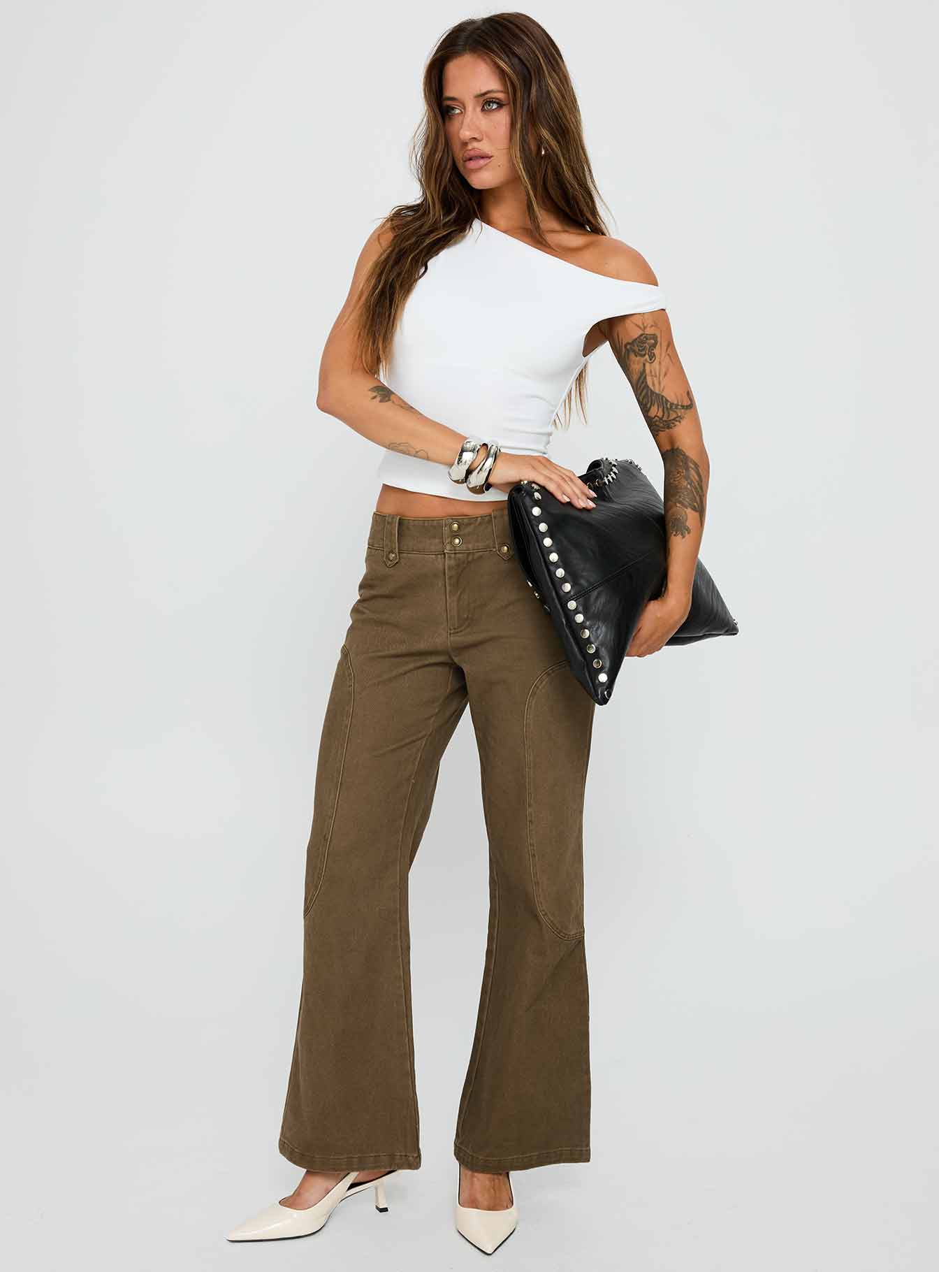 side view of model wearing Princess Polly Danza Top White Short Sleeves Asymmetric Neckline 