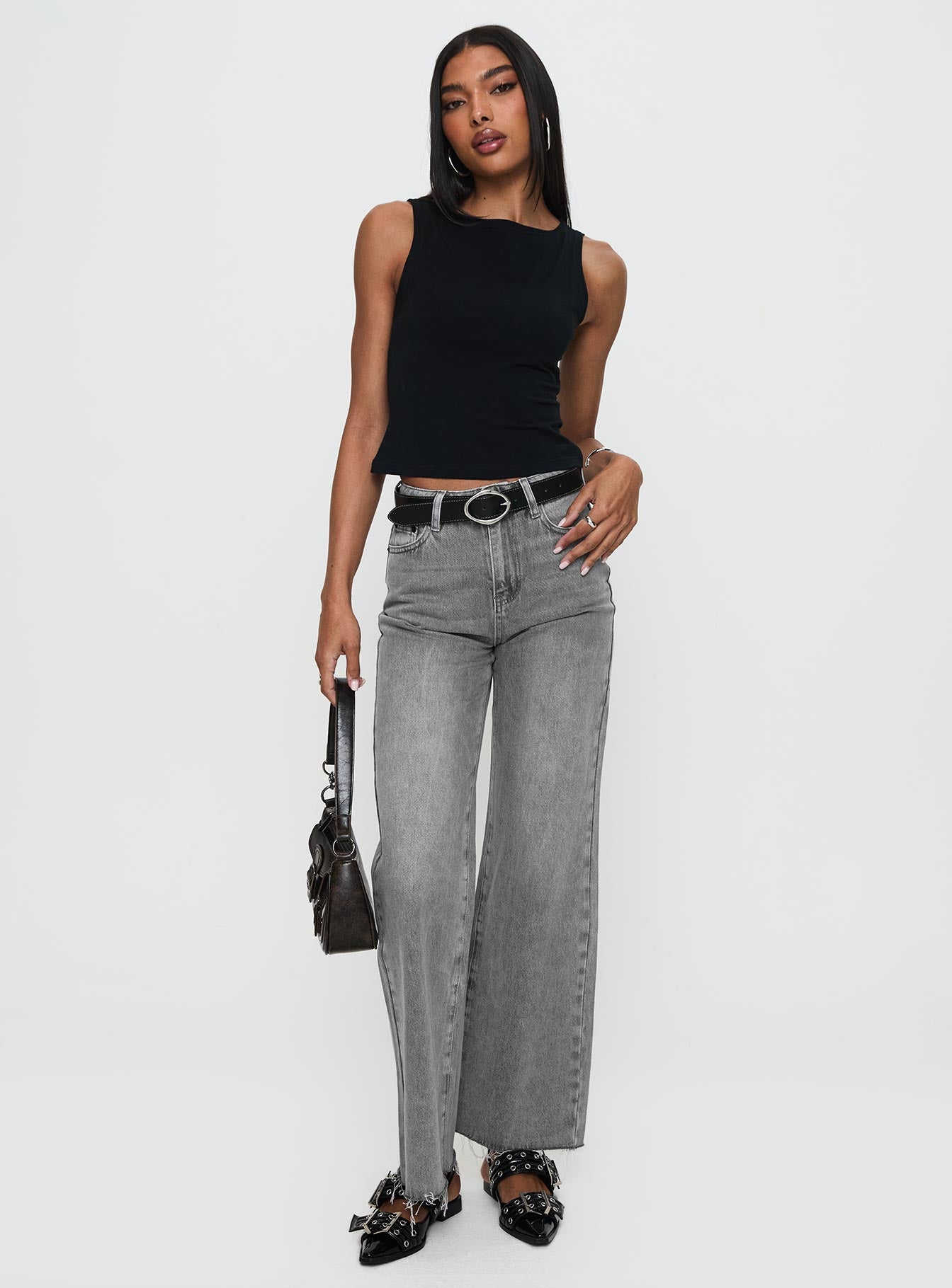 front view of model wearing Princess Polly Henesey Raw Hem Jeans Washed Grey High Waisted 