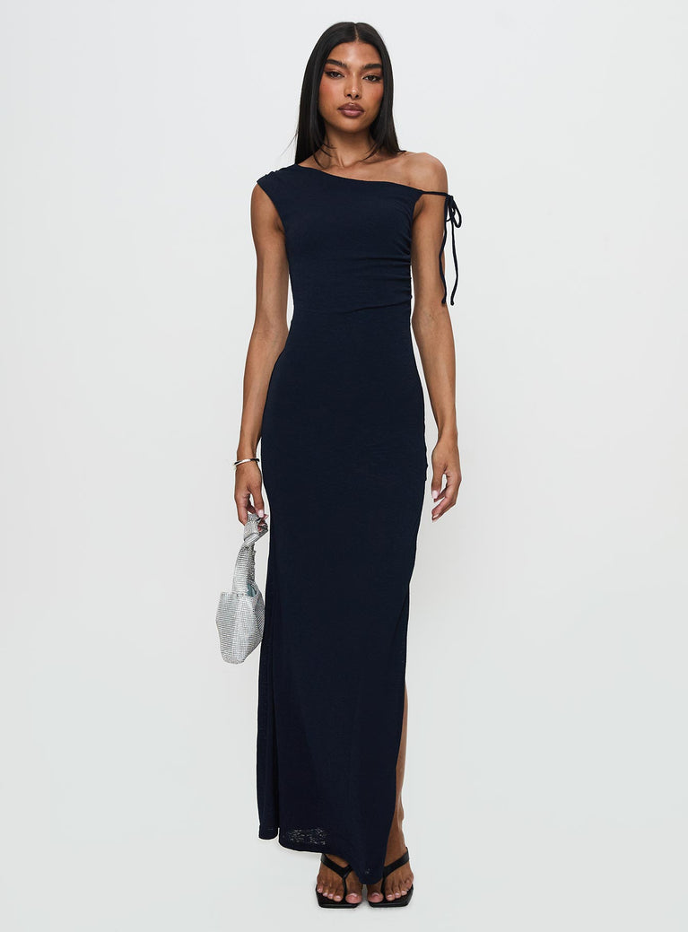 side view of model wearing Princess Polly Paislee Asymmetrical Maxi Dress Navy Asymmetric Neckline 