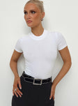 side view of model wearing Princess Polly Somner Bodysuit White Short Sleeves Crew Neck 