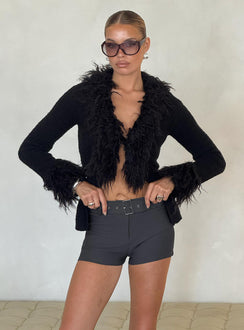 front view of model wearing Princess Polly Sistine Cardigan Black Longline Jumpers 