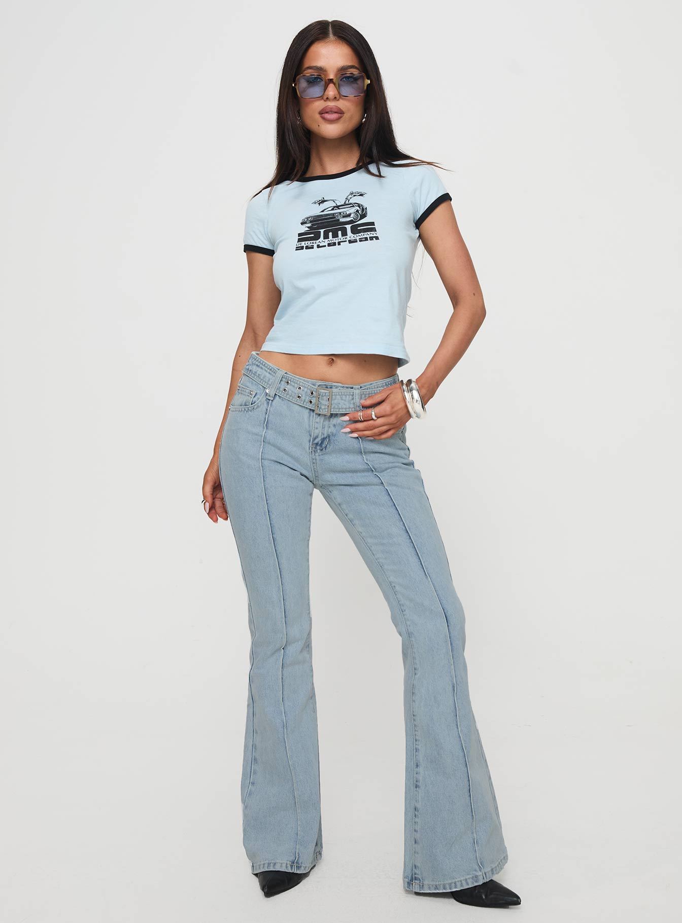 front view of model wearing Princess Polly Echovalley Low Rise Jeans Light Wash Mid Rise 