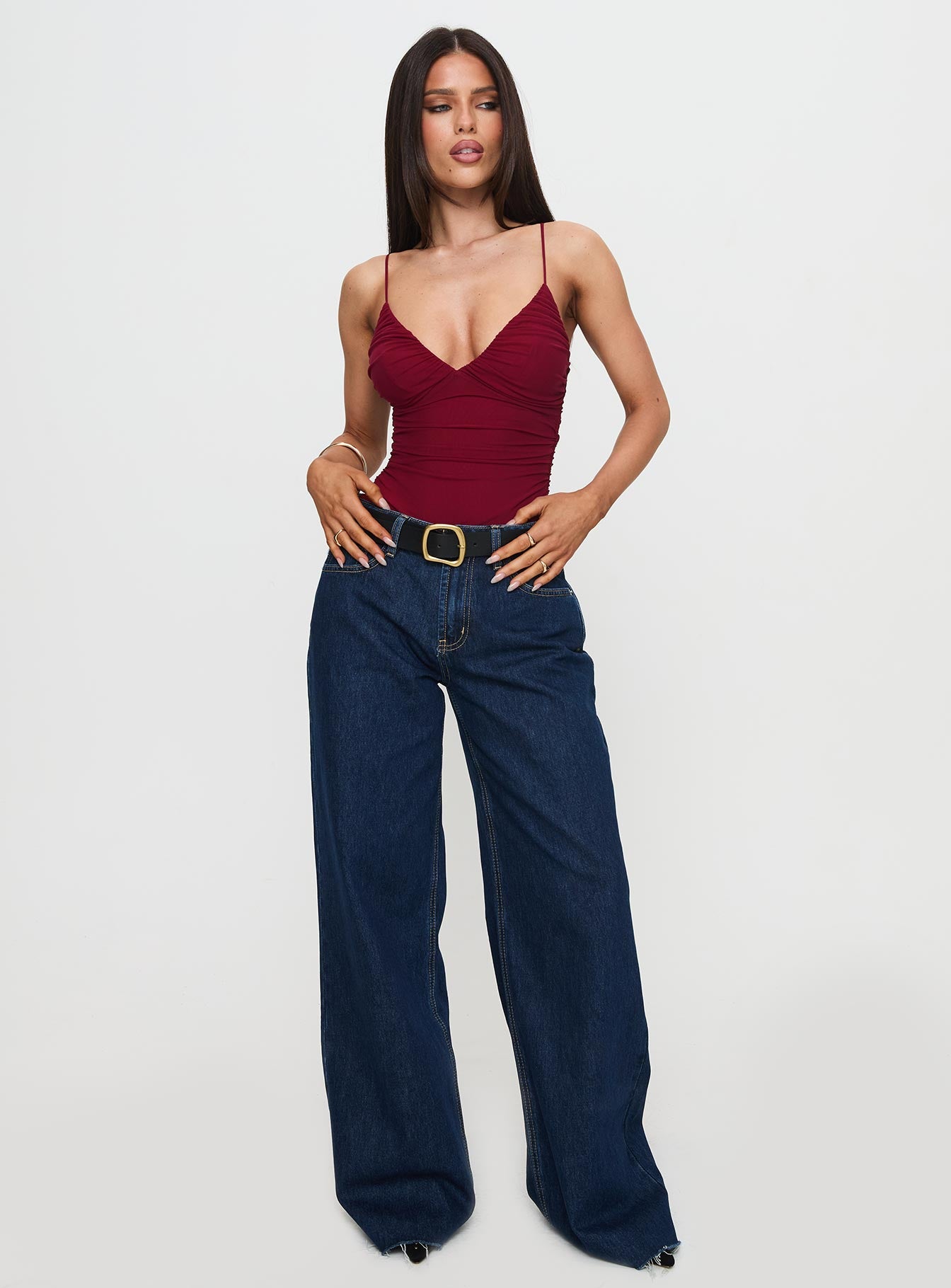 side view of model wearing Princess Polly Merril Bodysuit Maroon Sleeveless 