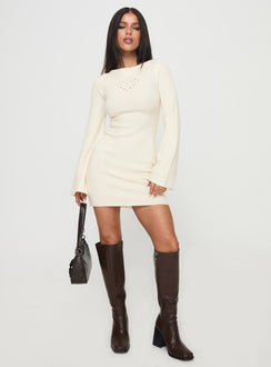 side view of model wearing Princess Polly Malcalm Long Sleeve Mini Dress Cream Crew Neck 