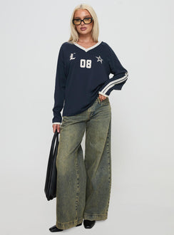 front view of model wearing Princess Polly Spectate Top Long Sleeve Navy Full Sleeves V-Neck 