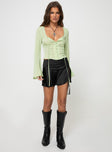 Front view of model wearing  front Princess Polly Full Sleeves High Neck  Kilby Long Sleeve Top Green