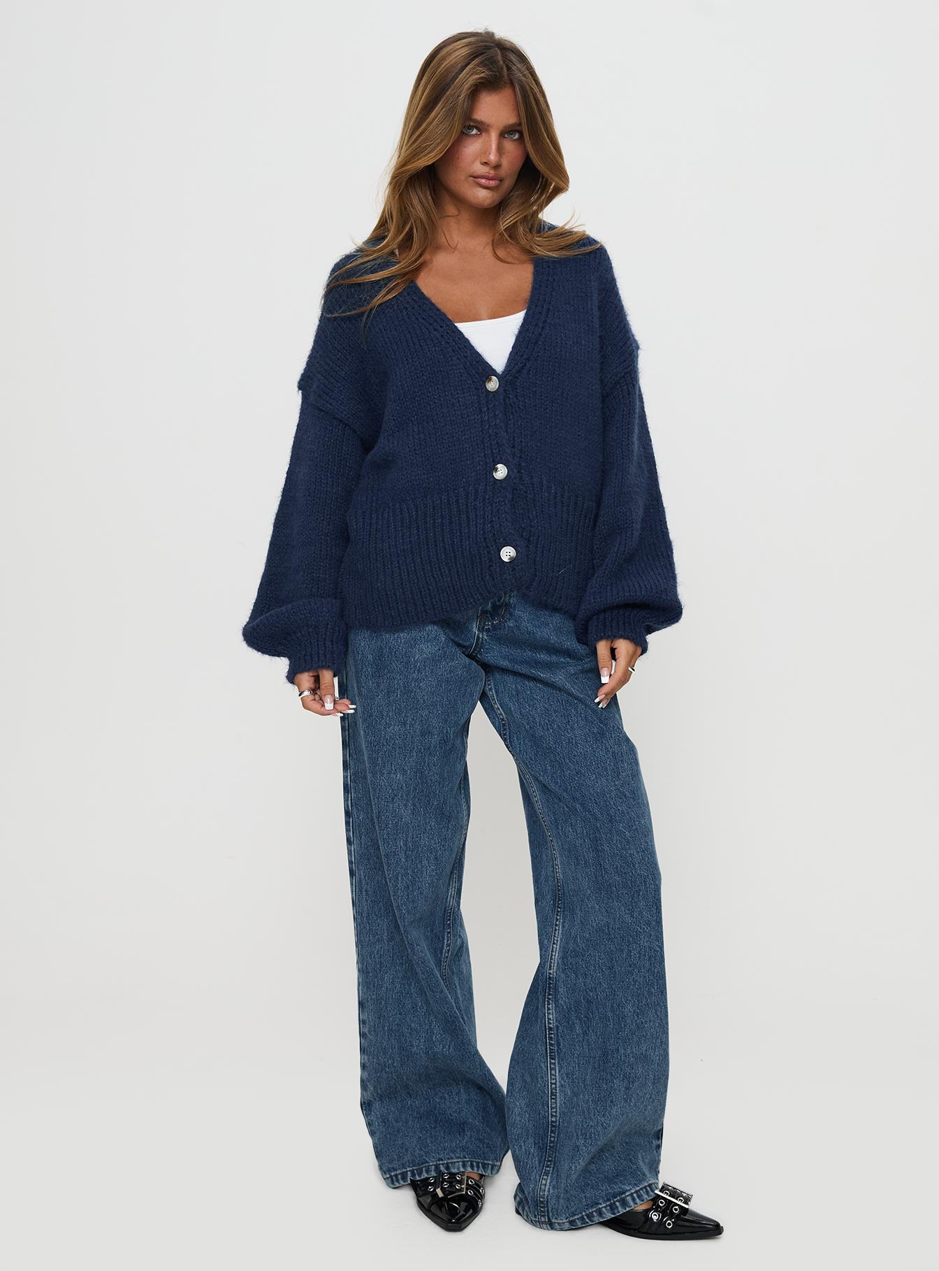 side view of model wearing Princess Polly Yasmyn Knit Cardigan Royal Blue Long 