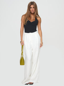 side view of model wearing Princess Polly Mallorcs Pants White High Waisted Pants 