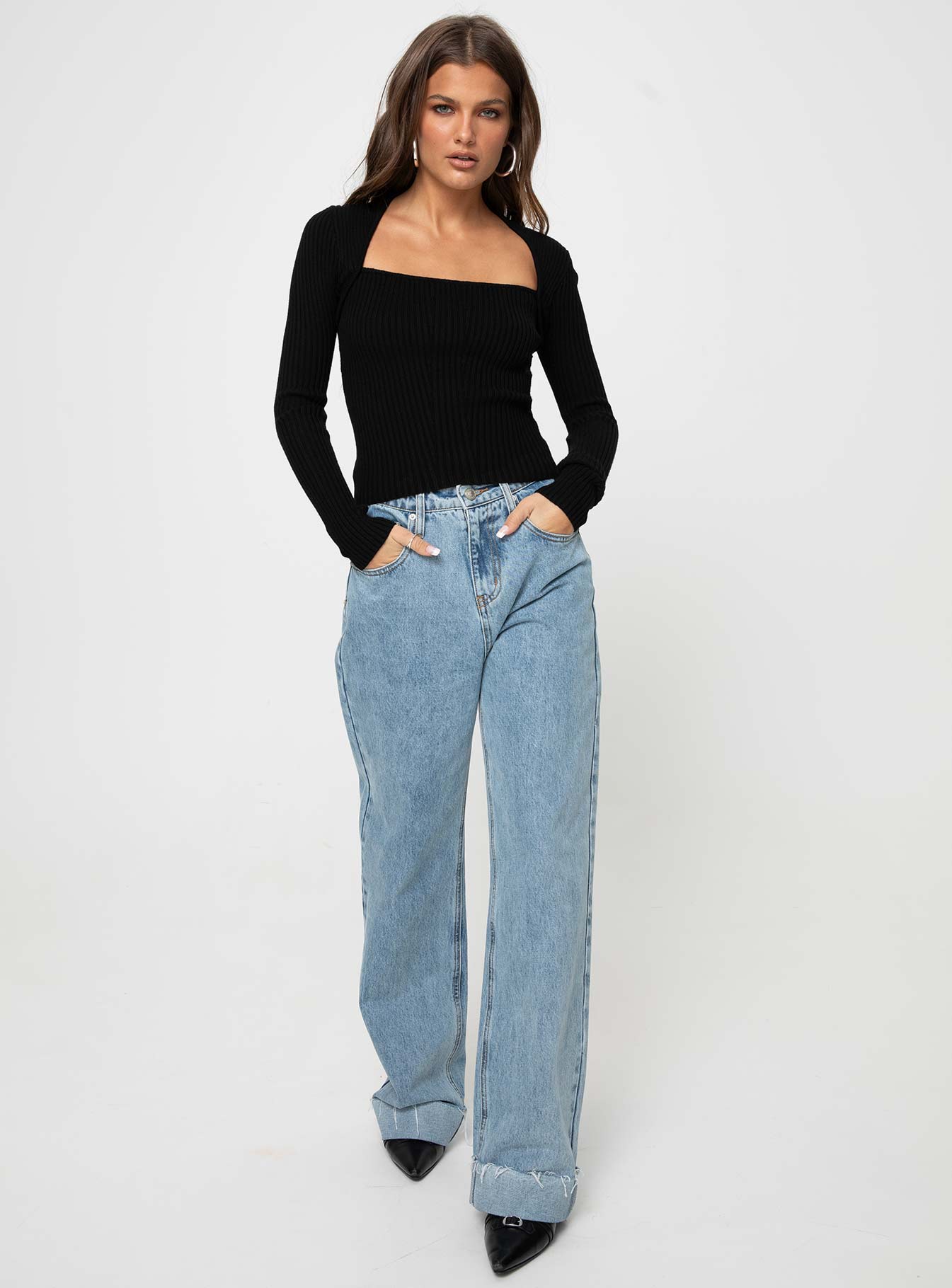 Front view of model wearing  front Princess Polly Full Sleeves Square Neck  Gleeson Square Neck Long Sleeve Top Black