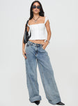 Crop top Fixed shoulder straps, button fastening down front, shirred band at back, split hem Non-stretch material, fully lined
