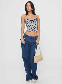 front view of model wearing Princess Polly Norde Top Floral Cluster Pale Grey Sleeveless V-Neck 