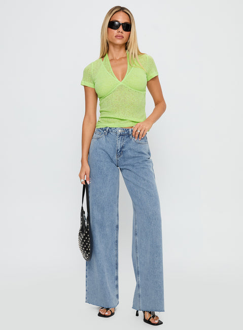 side view of model wearing Princess Polly Darla Low Rise Straight Jean Vintage Blue Wash Low Rise Jeans 