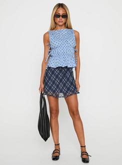 front view of model wearing Princess Polly Endless Summers Tie Side Top Blue Polka Dot Sleeveless Boat Neck 