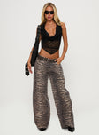 front view of model wearing Princess Polly Radical Baggy Jeans Tiger Low Rise Jeans 