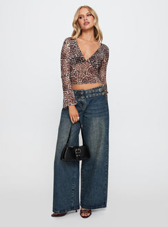 front view of model wearing Princess Polly Fast Times Long Sleeve Top Leopard Full Sleeves Plunger 