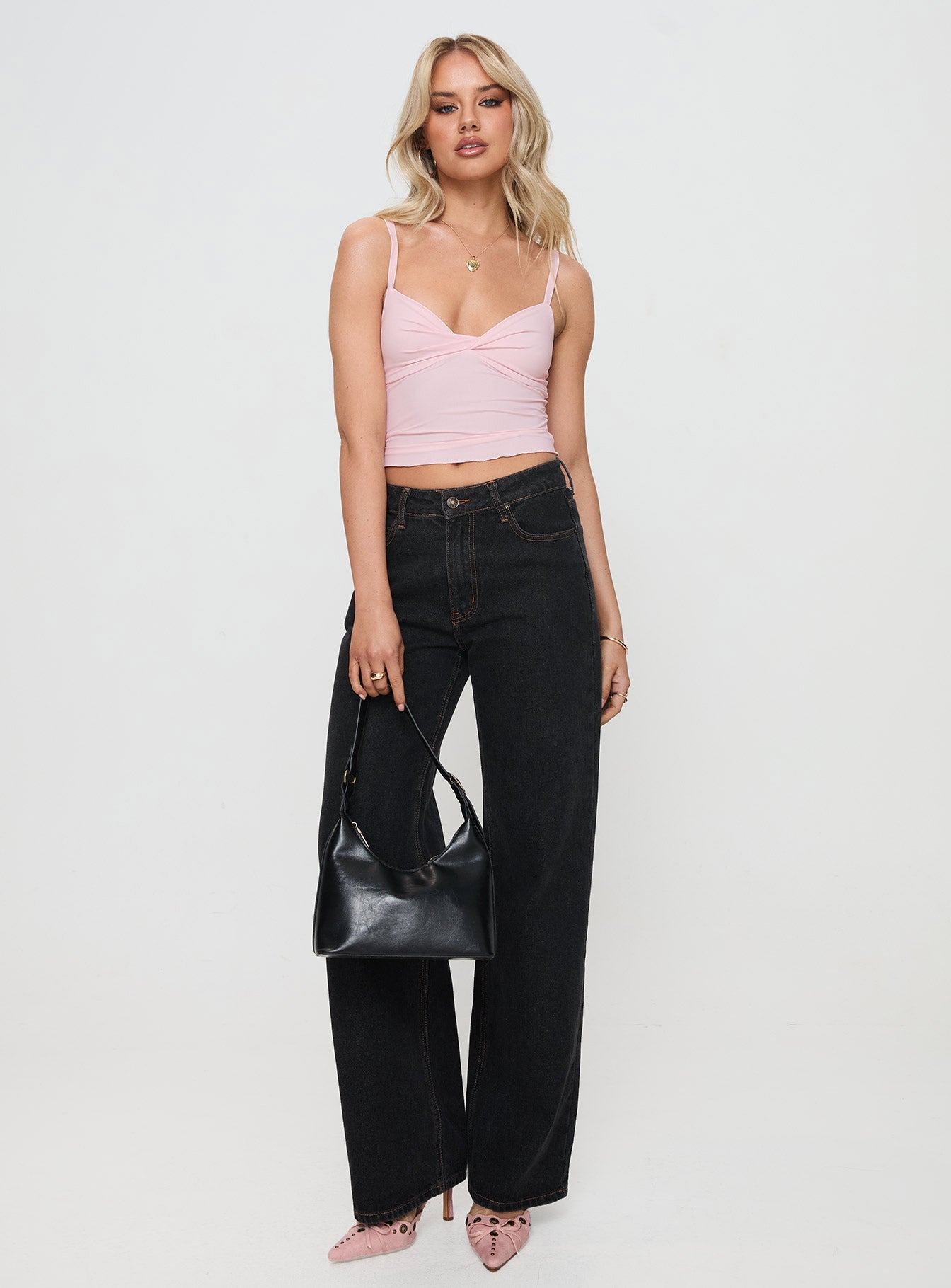 side view of model wearing Princess Polly Greyer Top Pink Sleeveless Plunger 