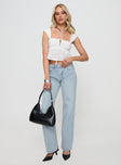 front view of model wearing Princess Polly Copperfield Baggy Denim Jeans Light Blue Wash High Waisted 