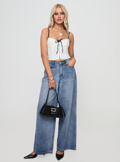 front view of model wearing Princess Polly Severas Top White Sleeveless Sweetheart 